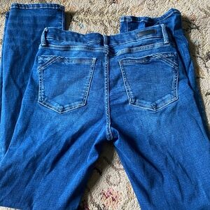 Buckle black bootcut jeans